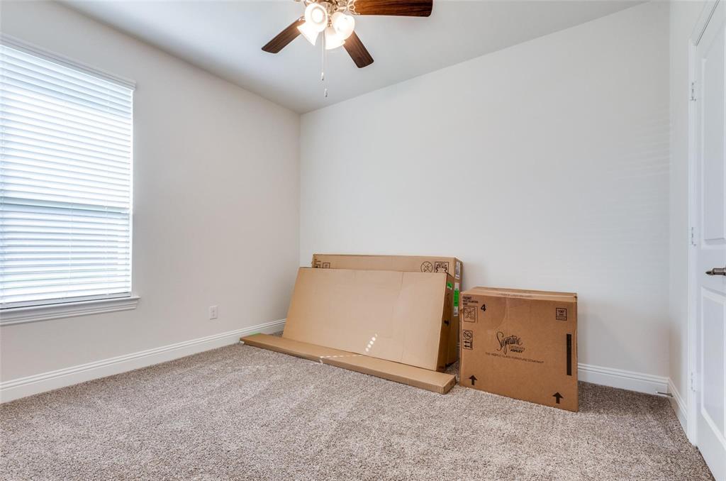 3205 Platinum Road Aubrey, TX 76227 - Photo 15 of 25 an empty room with a window