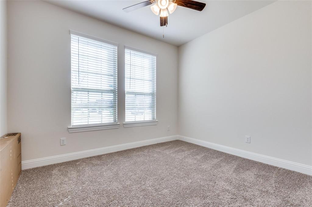 3205 Platinum Road Aubrey, TX 76227 - Photo 16 of 25 an empty room with a window