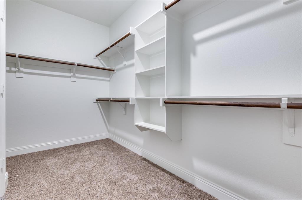 3205 Platinum Road Aubrey, TX 76227 - Photo 21 of 25 a view of a room with shelf