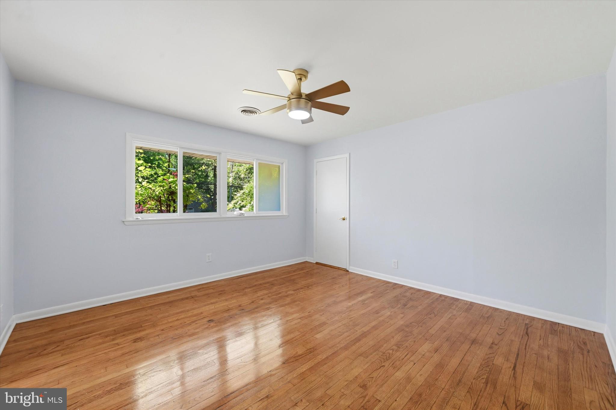 103 Baynard Boulevard Wilmington, DE 19803 - Photo 25 of 35 an empty room with a window and a fan