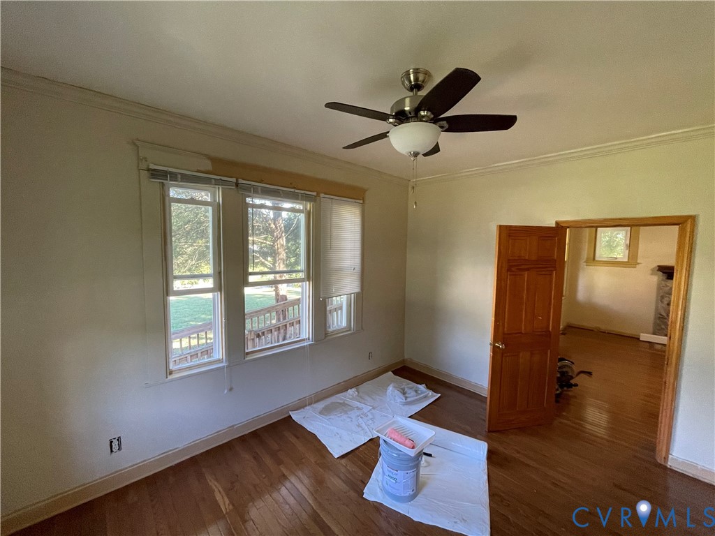 4667 Bell Road Powhatan, VA 23139 - Photo 4 of 10 a living room with furniture and a window