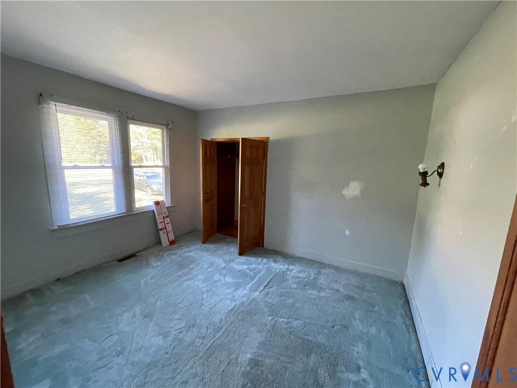 4667 Bell Road Powhatan, VA 23139 - Photo 7 of 10 an empty room with windows