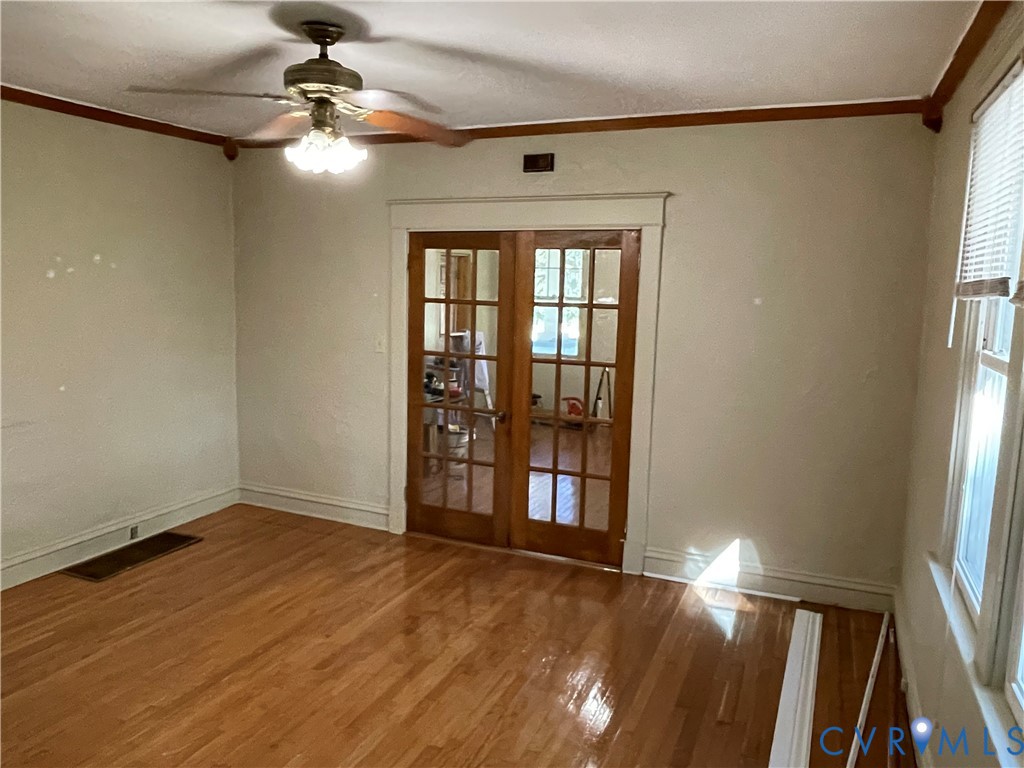 4667 Bell Road Powhatan, VA 23139 - Photo 10 of 10 wooden floor in an empty room with a window