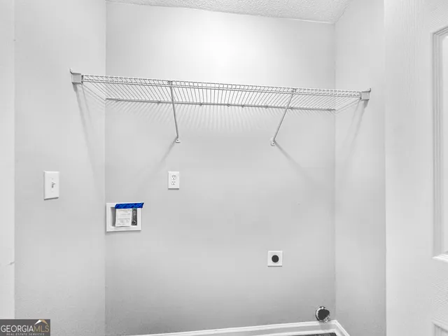 a view of small space with racks on the wall