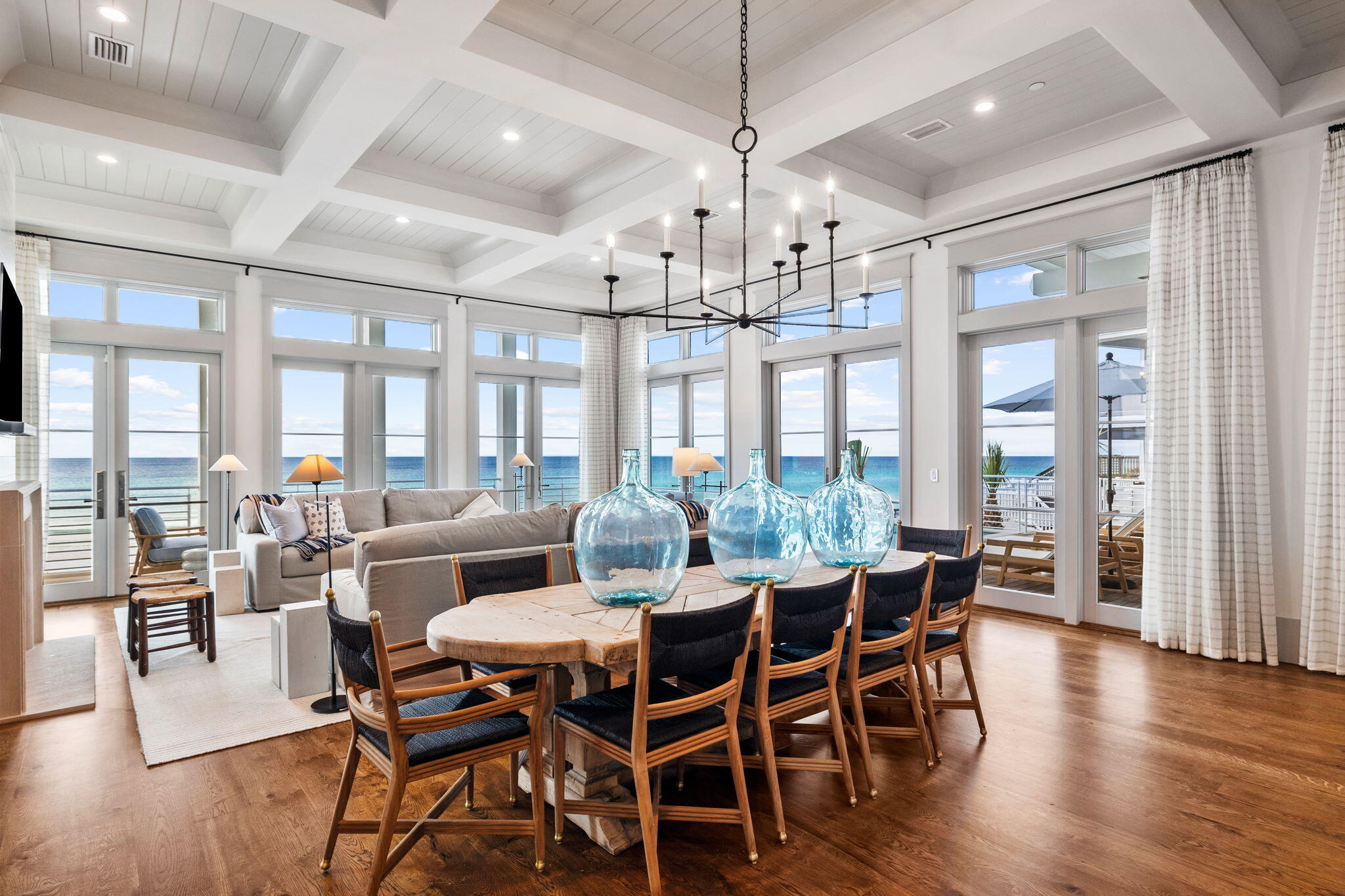 71 Chivas Lane Santa Rosa Beach, FL 32459 - Photo 35 of 128 a view of a dining room with furniture wooden floor and chandelier