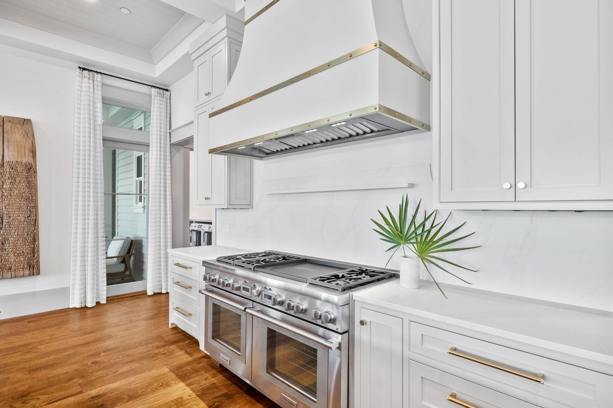 71 Chivas Lane Santa Rosa Beach, FL 32459 - Photo 41 of 128 a kitchen with stainless steel appliances a white stove top oven and a potted plant