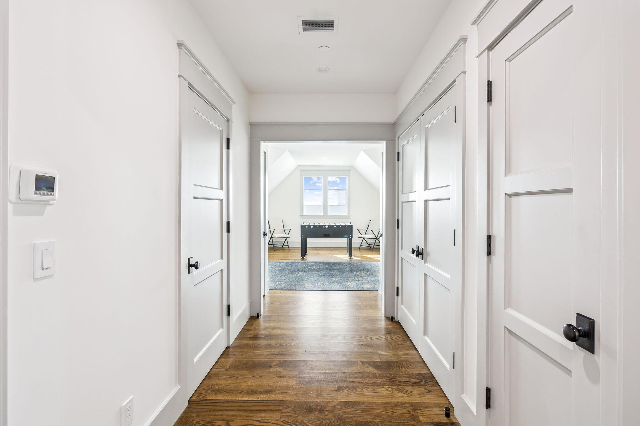 71 Chivas Lane Santa Rosa Beach, FL 32459 - Photo 98 of 128 a view of a hallway with wooden floor and staircase