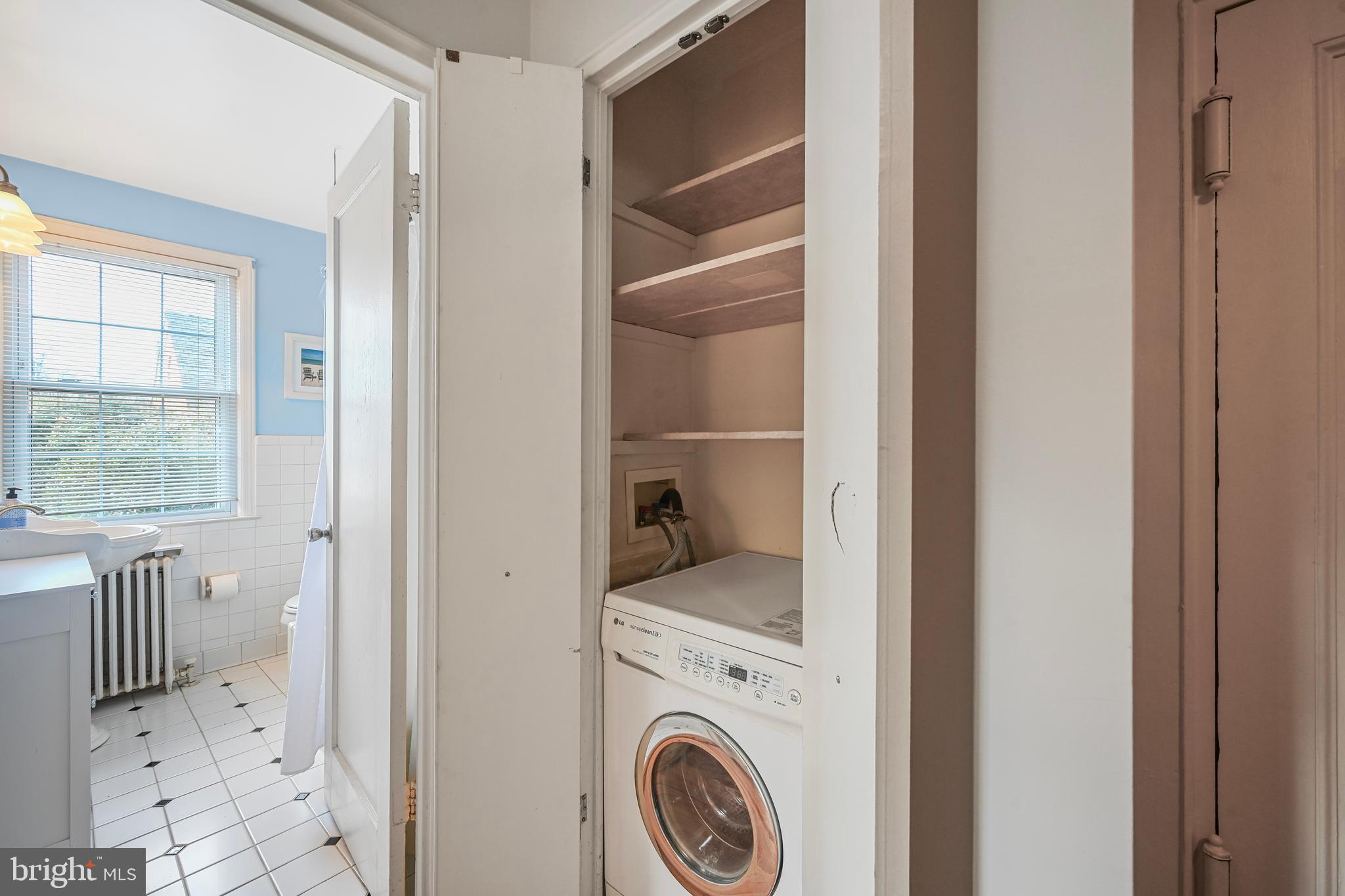 2402 Colston Drive, Unit 204 Silver Spring, MD 20910 - Photo 10 of 13 a view of storage and utility room in a kitchen