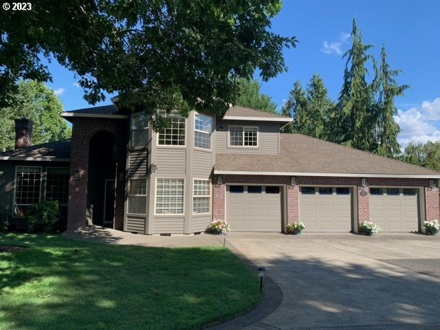 3200 Northeast Jackson Rd Loop Hillsboro, OR 97124 - Photo 1 of 37 front view of a house with a yard