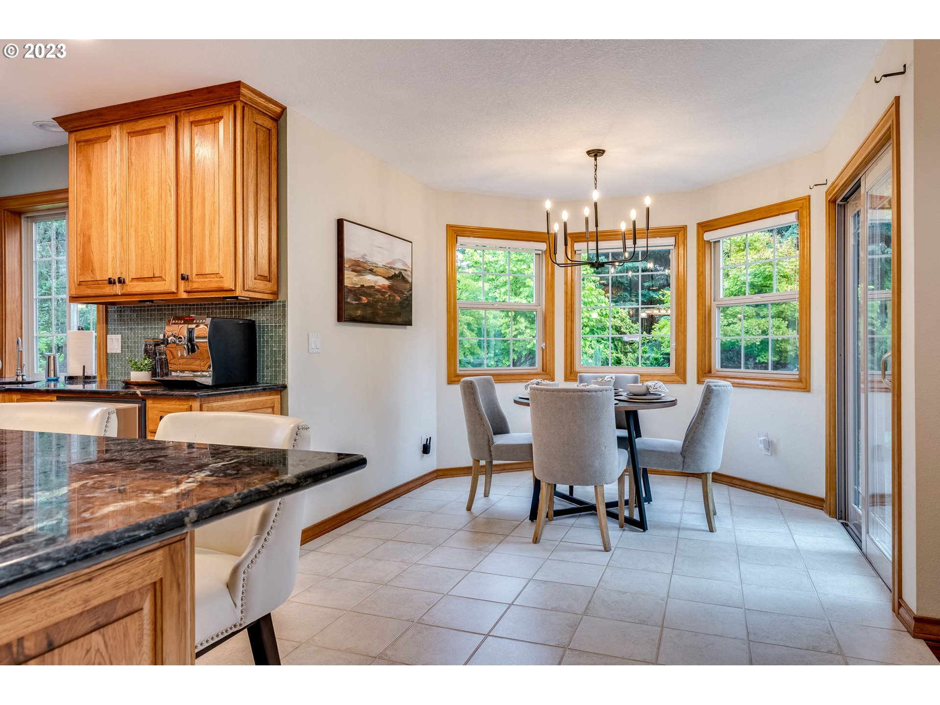 3200 Northeast Jackson Rd Loop Hillsboro, OR 97124 - Photo 17 of 37 a view of a dining room with furniture window and outside view