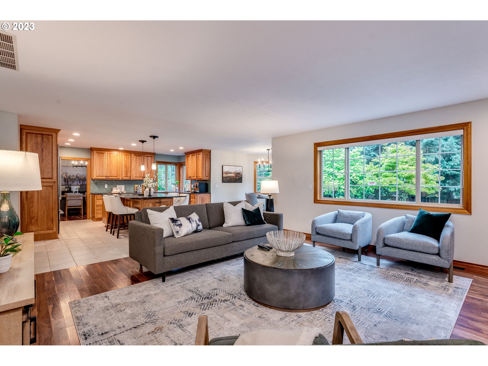 3200 Northeast Jackson Rd Loop Hillsboro, OR 97124 - Photo 21 of 37 a living room with furniture and a large window