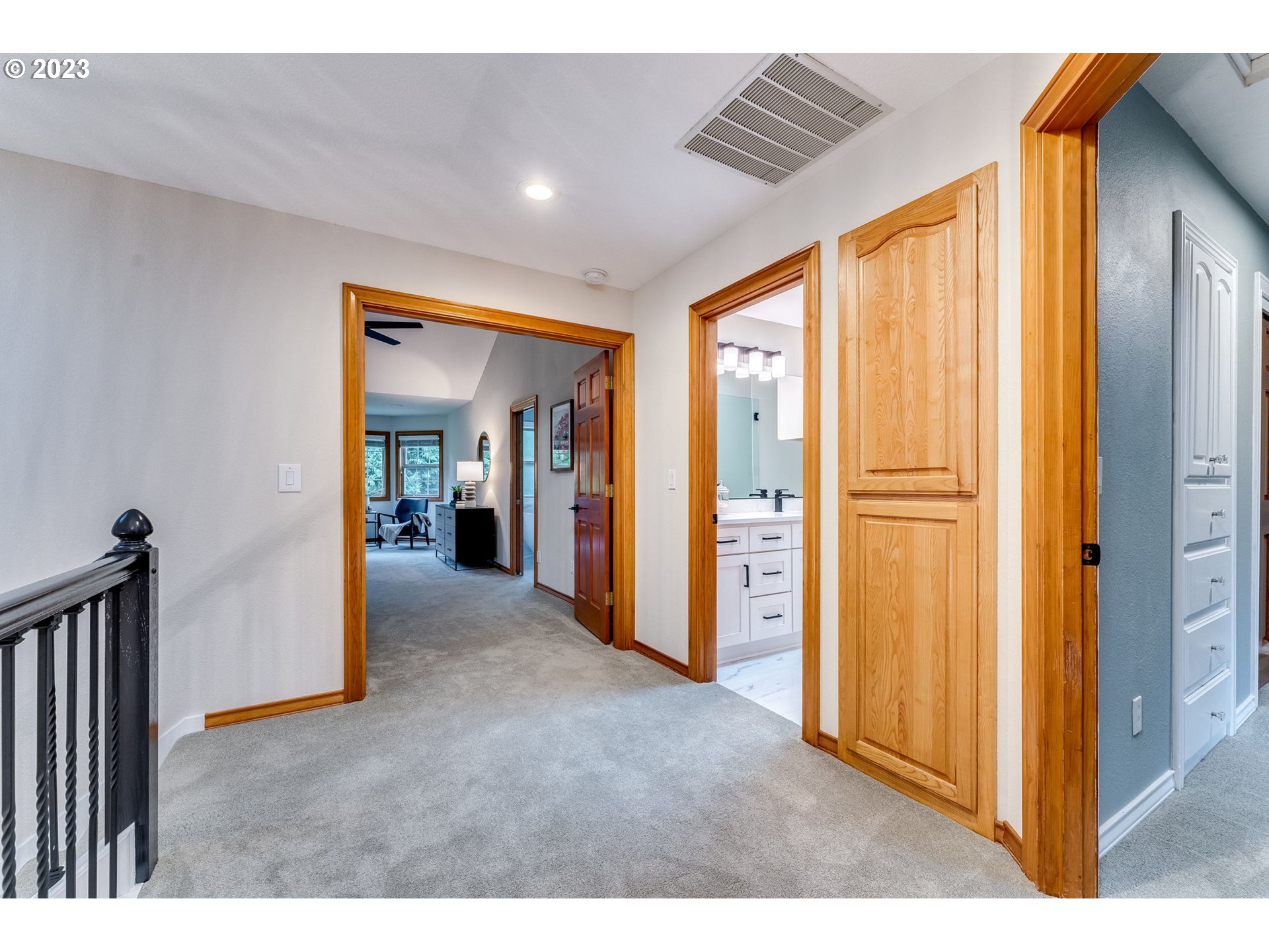 3200 Northeast Jackson Rd Loop Hillsboro, OR 97124 - Photo 25 of 37 a view of hallway with furniture and a window