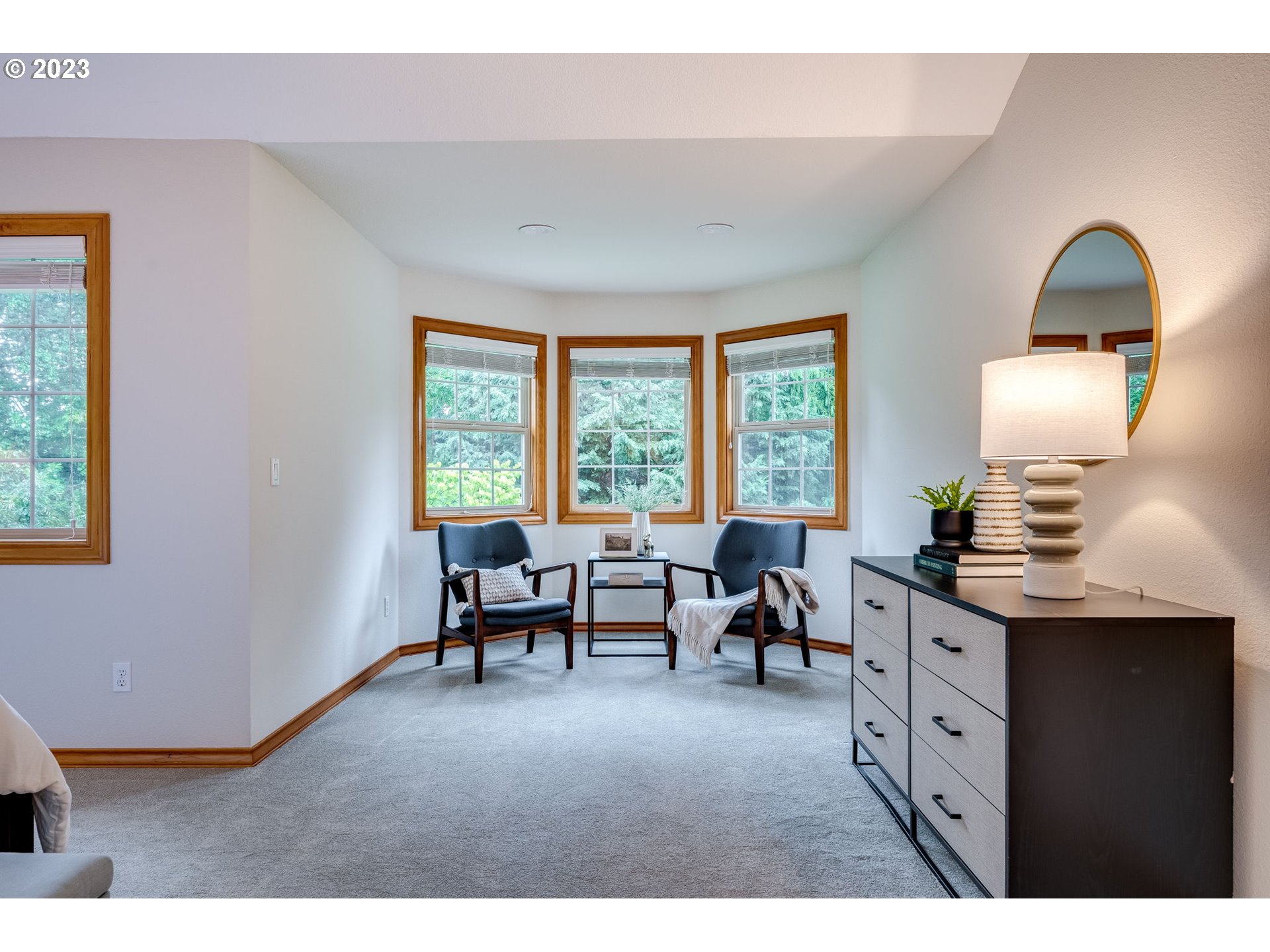 3200 Northeast Jackson Rd Loop Hillsboro, OR 97124 - Photo 27 of 37 a living room with furniture two window and a view of living room