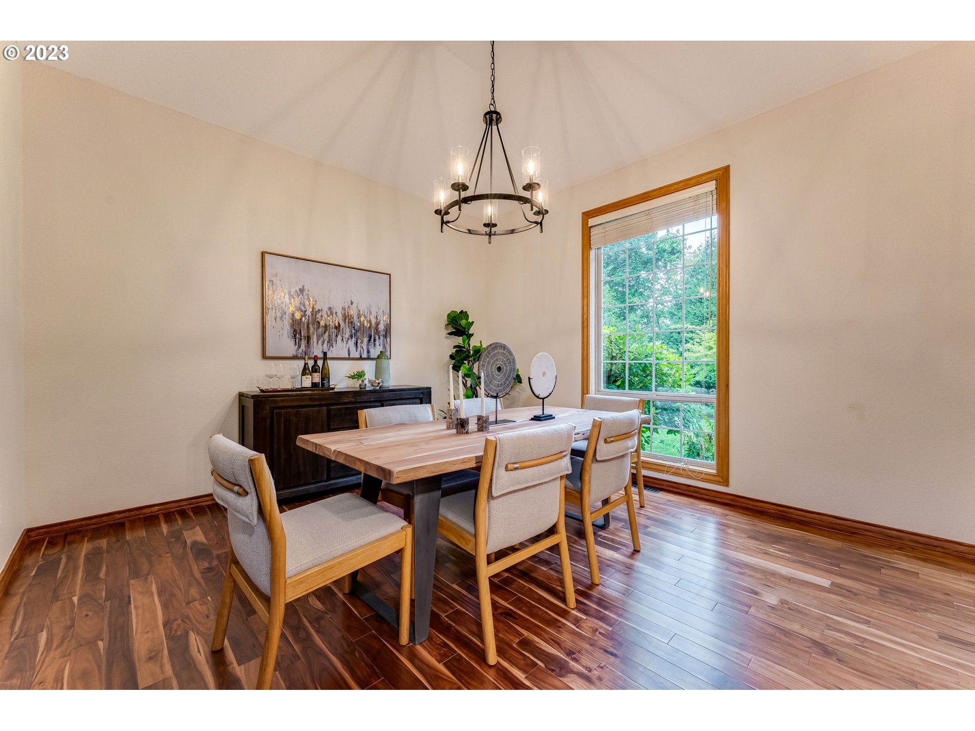 3200 Northeast Jackson Rd Loop Hillsboro, OR 97124 - Photo 8 of 37 a view of a dining room with furniture window and wooden floor