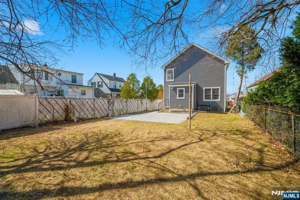 a house view with a backyard space