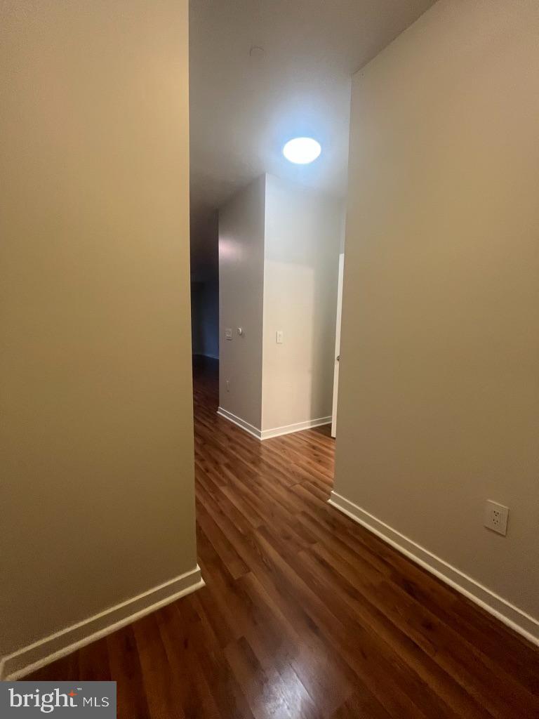 401 Race Street, Unit D Philadelphia, PA 19106 - Photo 12 of 23 wooden floor in an empty room