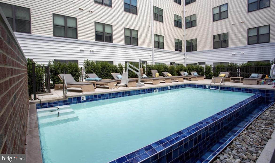 401 Race Street, Unit D Philadelphia, PA 19106 - Photo 17 of 23 a view of swimming pool with outdoor seating