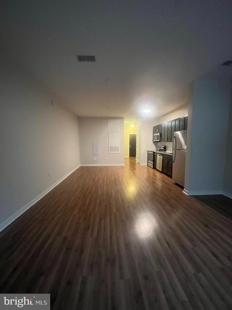 401 Race Street, Unit D Philadelphia, PA 19106 - Photo 5 of 23 a view of empty room with wooden floor