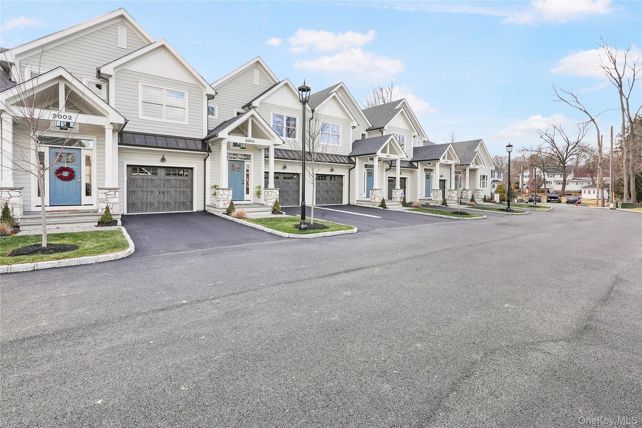 2040 Crompond Road, Unit 22 Yorktown Heights, NY 10598 - Photo 1 of 19 View of front of property with a garage