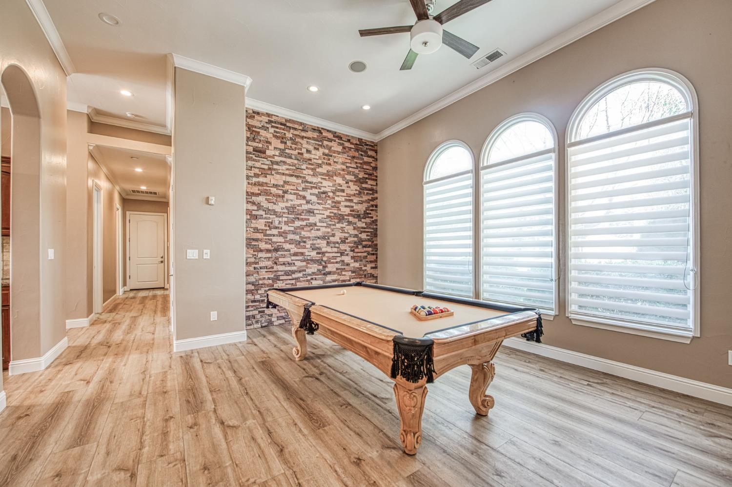 12629 Bronco Road Madera, CA 93636 - Photo 35 of 94 a room with wooden floor pool table and windows