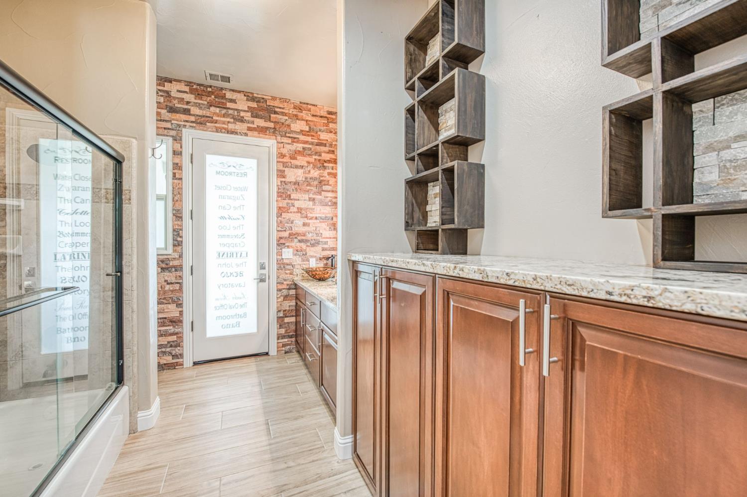 12629 Bronco Road Madera, CA 93636 - Photo 53 of 94 a kitchen with stainless steel appliances granite countertop a refrigerator and a sink