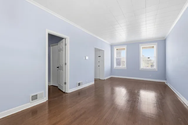 an empty room with windows