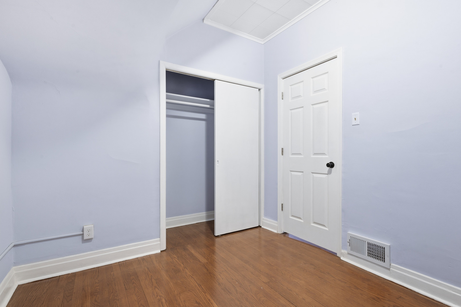 2102 South 50th Avenue Cicero, IL 60804 - Photo 29 of 53 a view of an empty room with wooden floor