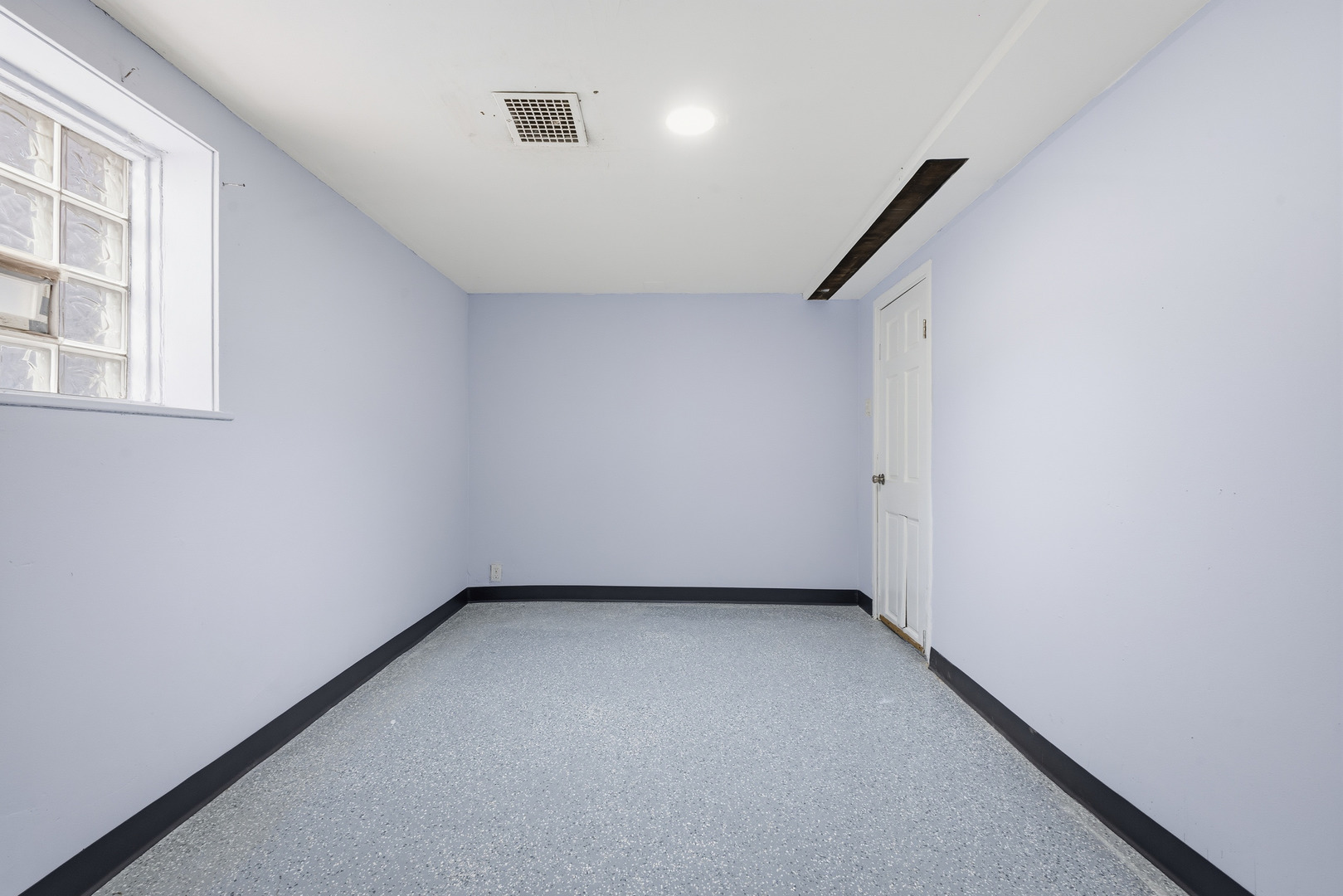 2102 South 50th Avenue Cicero, IL 60804 - Photo 37 of 53 an empty room with windows