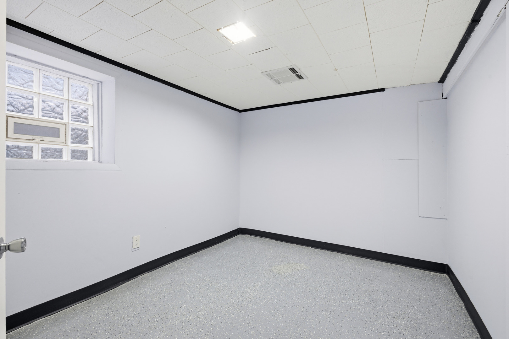 2102 South 50th Avenue Cicero, IL 60804 - Photo 39 of 53 a view of an empty room with a window