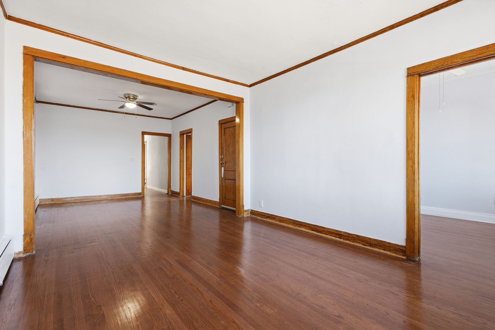 2102 South 50th Avenue Cicero, IL 60804 - Photo 5 of 53 a view of an empty room with wooden floor