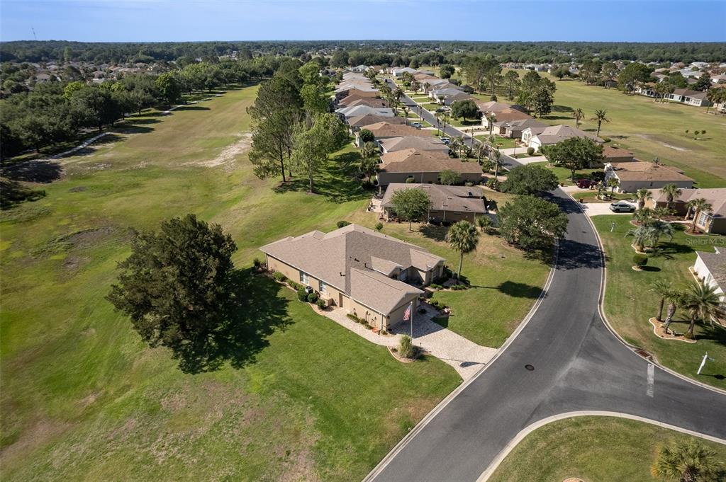 15525 Southwest 14th Avenue Road Ocala, FL 34473 - Photo 67 of 75 an aerial view of residential houses with outdoor space