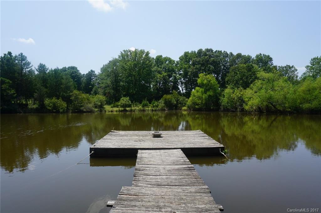 1823 Wisdom Road Lancaster, SC 29720 - Photo 18 of 23 a view of a lake with a large trees