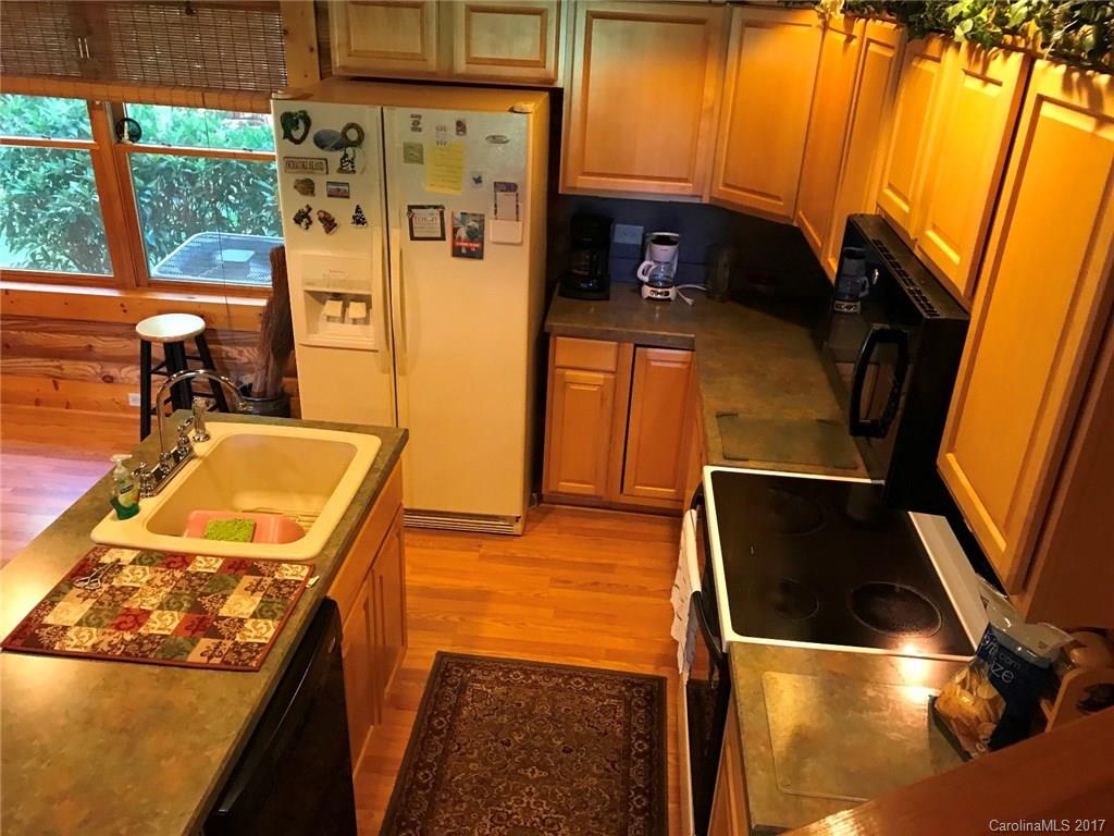 1823 Wisdom Road Lancaster, SC 29720 - Photo 8 of 23 a kitchen with a sink and a stove top oven
