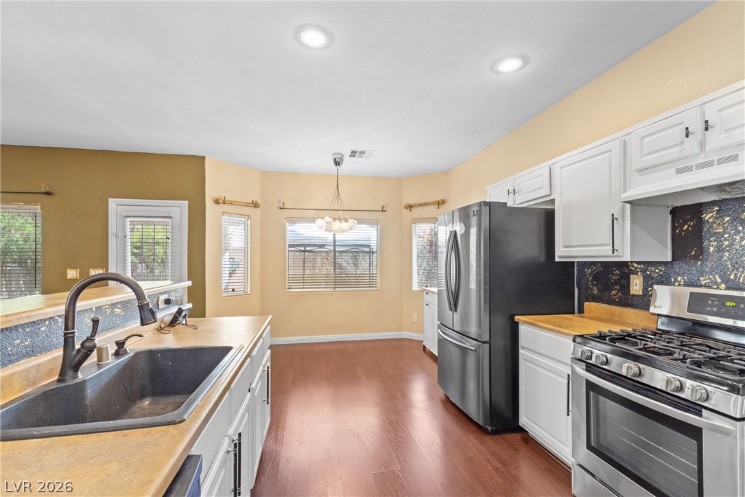 8934 Deep Ridge Court Las Vegas, NV 89178 - Photo 12 of 47 A well-appointed kitchen featuring a functional layout and ample natural light.