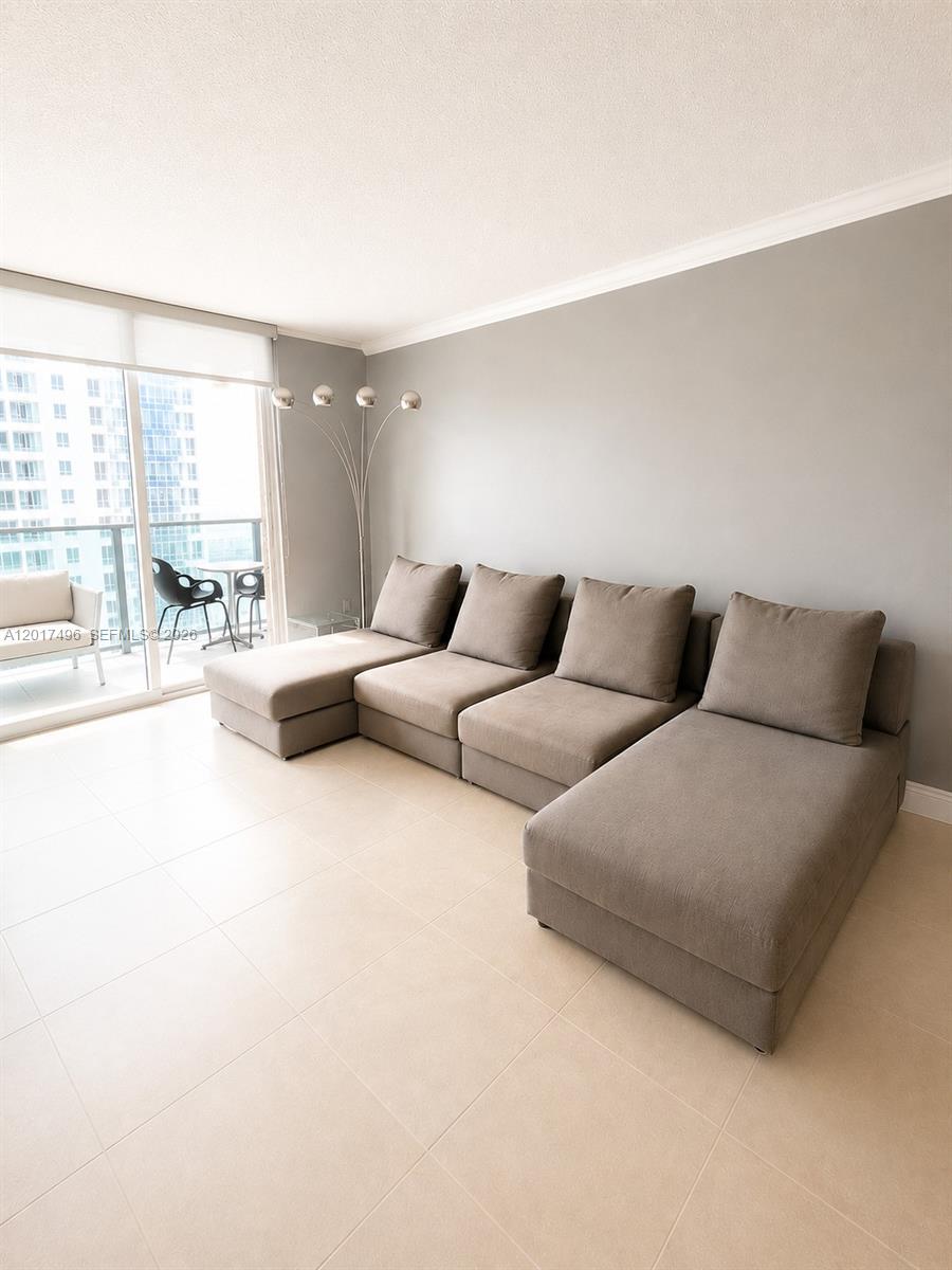 Brickell Miami, FL 33131 - Photo 4 of 19 a living room with furniture and a large window
