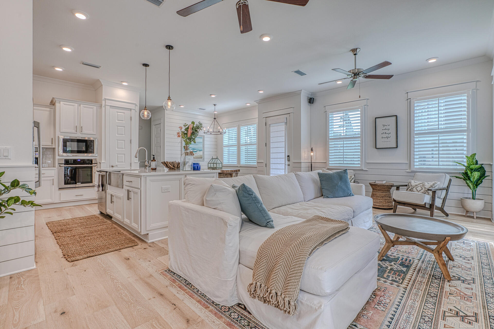 141 Pine Lands Loop Inlet Beach, Unit A Inlet Beach, FL 32461 - Photo 12 of 44 a living room with furniture and kitchen view