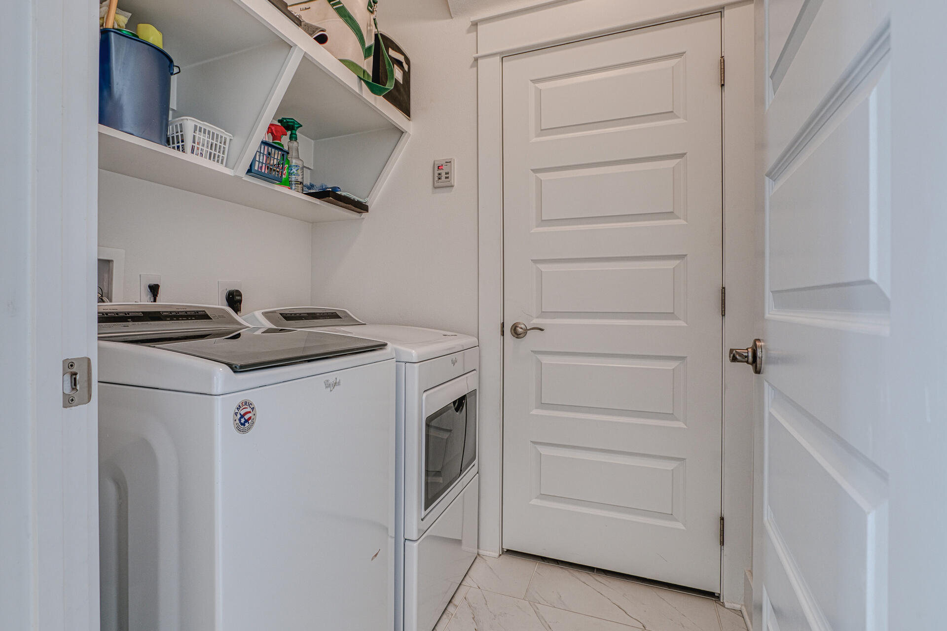 141 Pine Lands Loop Inlet Beach, Unit A Inlet Beach, FL 32461 - Photo 18 of 44 a utility room with dryer and washer
