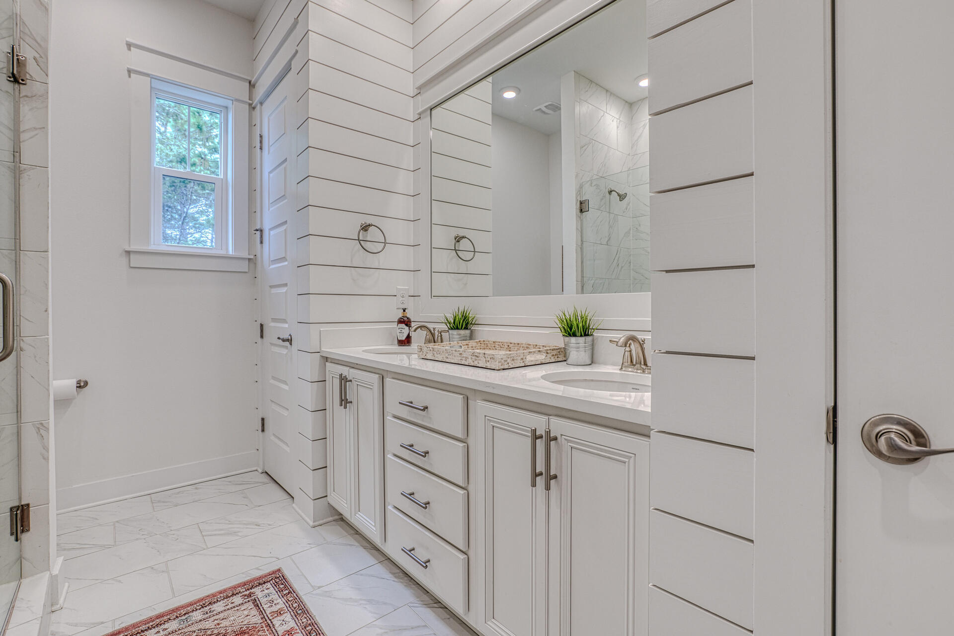 141 Pine Lands Loop Inlet Beach, Unit A Inlet Beach, FL 32461 - Photo 28 of 44 a bathroom with a sink and a mirror