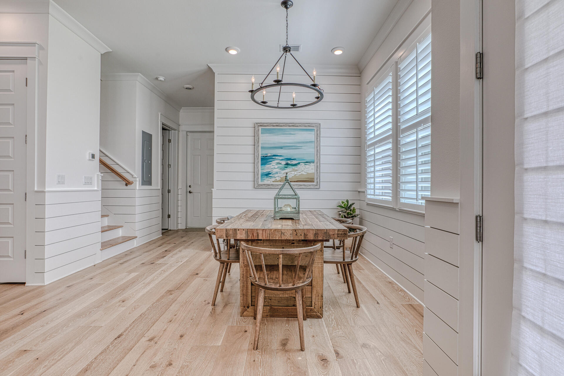 141 Pine Lands Loop Inlet Beach, Unit A Inlet Beach, FL 32461 - Photo 6 of 44 a view of a dining room with furniture window and wooden floor