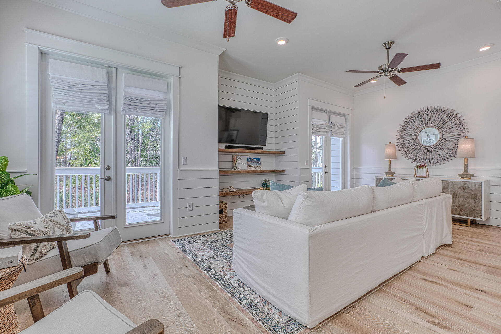 141 Pine Lands Loop Inlet Beach, Unit A Inlet Beach, FL 32461 - Photo 7 of 44 a living room with furniture and a flat screen tv