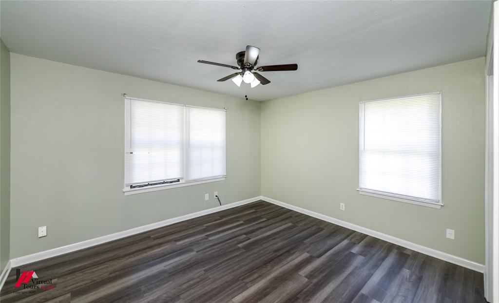 3109 Gorton Road Shreveport, LA 71119 - Photo 16 of 31 a view of empty room with wooden floor and fan