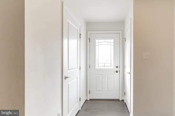 a view of a bathroom with a bathtub