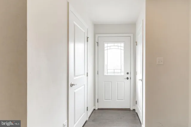 a view of a bathroom with a bathtub