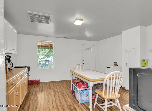 a view of livingroom with furniture and a window