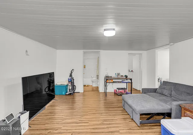 a kitchen with stainless steel appliances kitchen island granite countertop a sink and cabinets