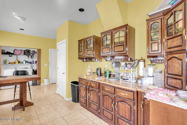 a bathroom with a bathtub and a shower curtain