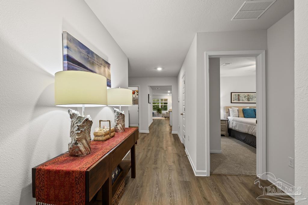 5443 Peach Drive Pace, FL 32571 - Photo 7 of 34 a en suite bathroom with a sink and a mirror