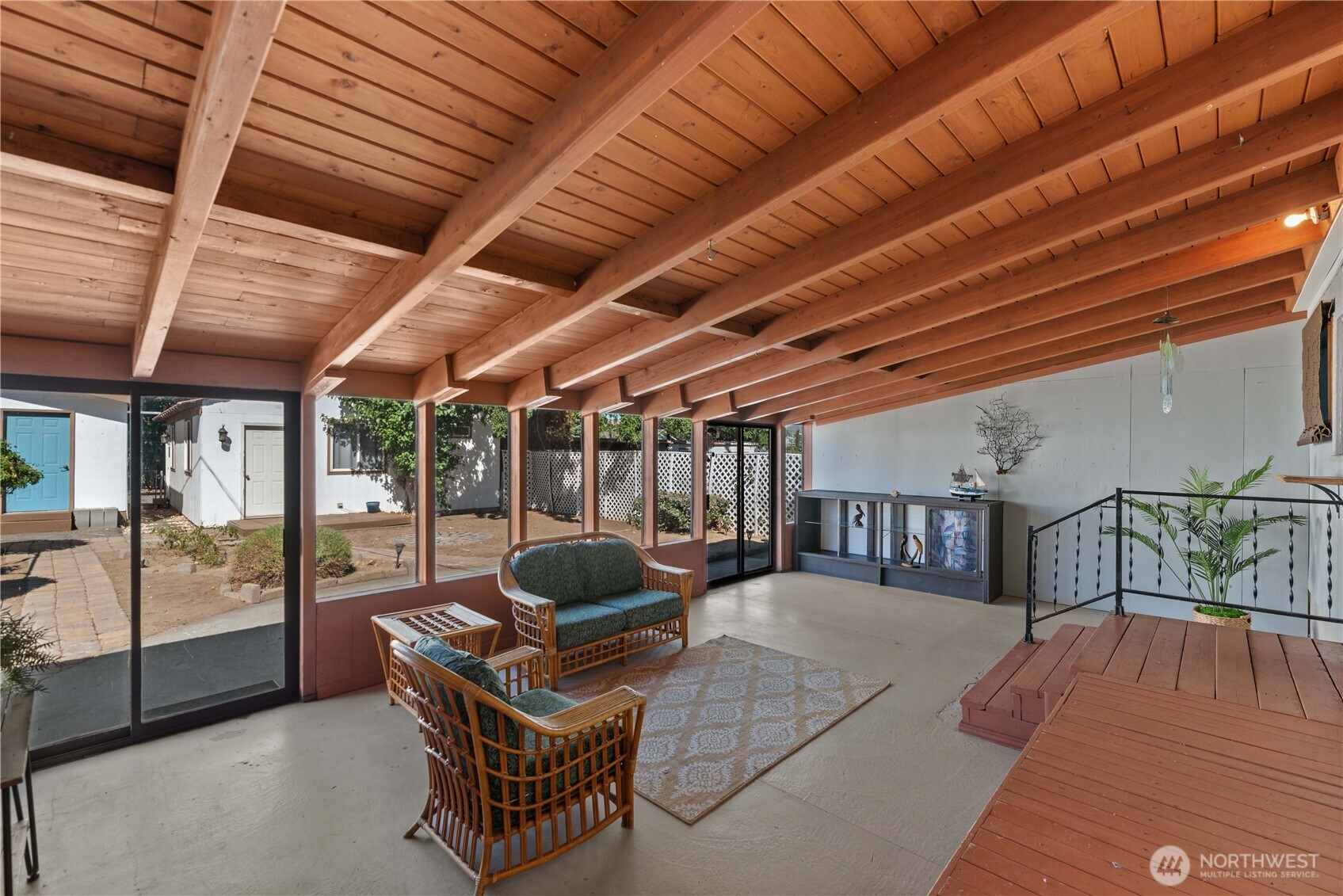 22 South Emerson Avenue Wenatchee, WA 98801 - Photo 16 of 38 a building outdoor space with patio furniture and garden view