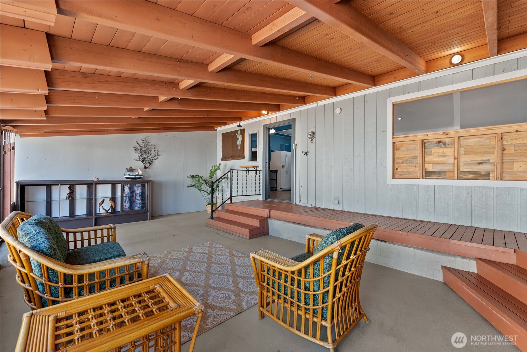22 South Emerson Avenue Wenatchee, WA 98801 - Photo 17 of 38 a outdoor space with patio furniture and wooden floor