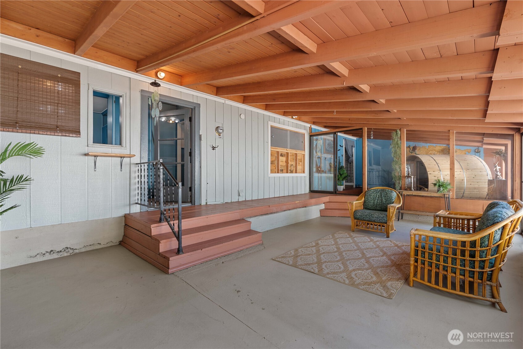 22 South Emerson Avenue Wenatchee, WA 98801 - Photo 19 of 38 a outdoor space with patio furniture and a potted plant